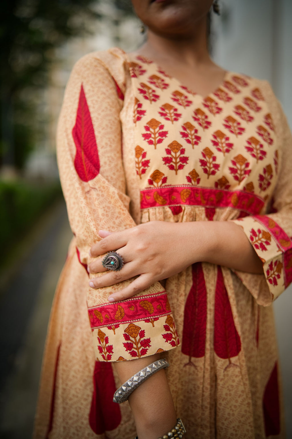 Beige & Red Leaf Print A-line Kurta With Pant