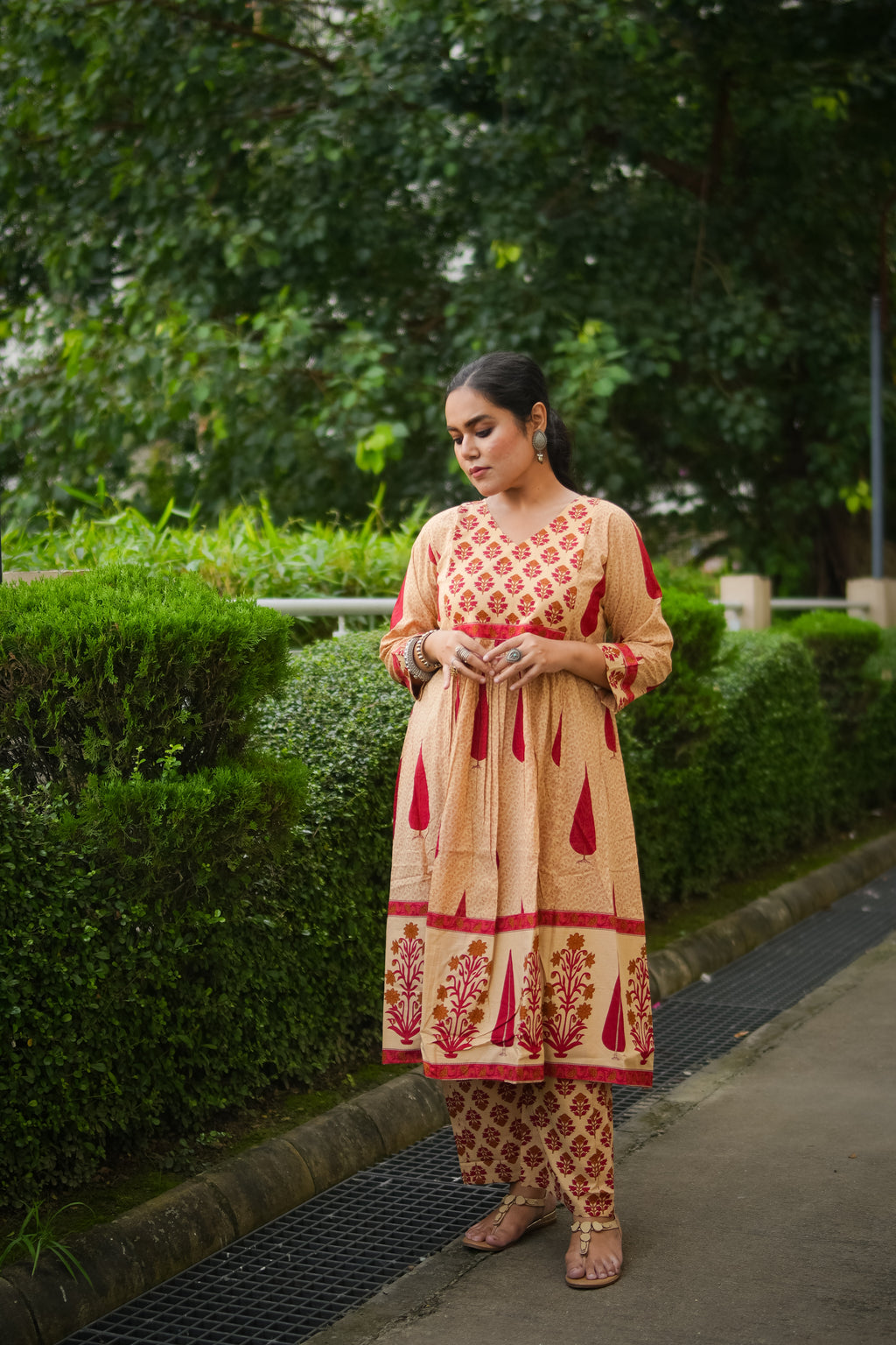 Beige & Red Leaf Print A-line Kurta With Pant