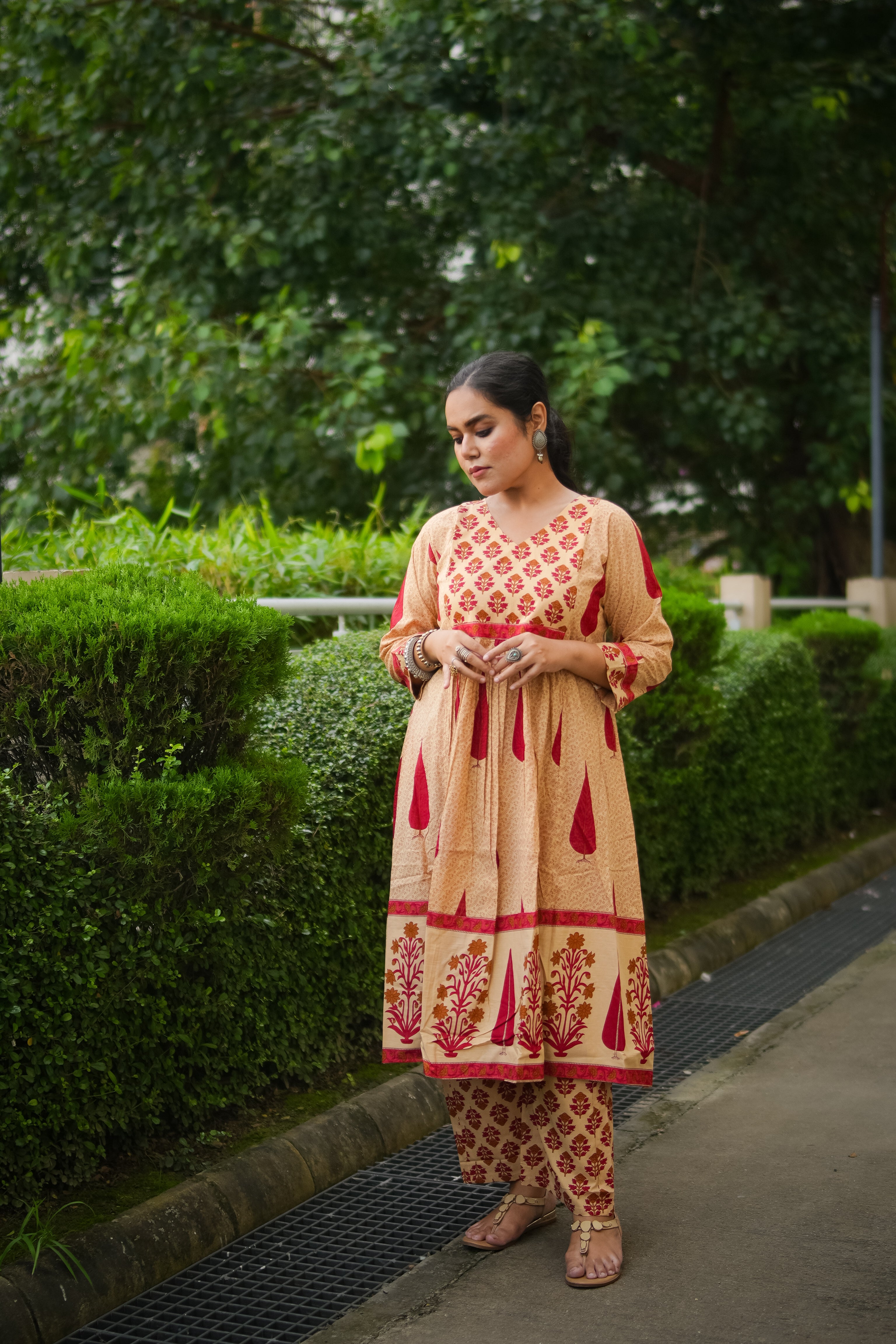 Beige & Red Leaf Print A-line Kurta With Pant