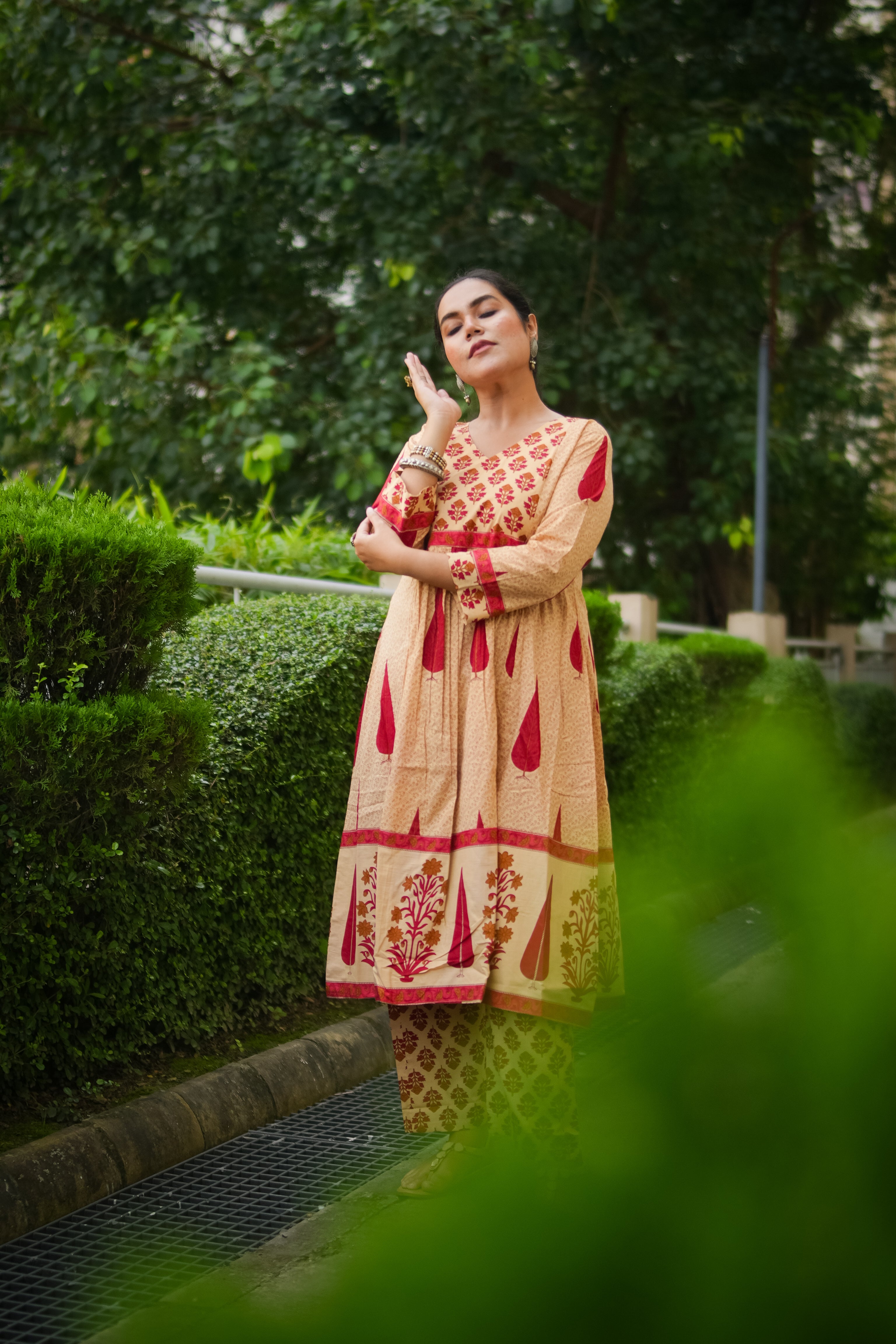 Beige & Red Leaf Print A-line Kurta With Pant